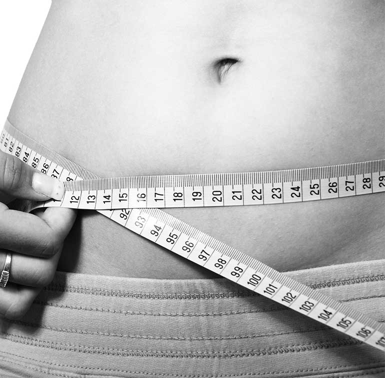 Woman with measuring tape